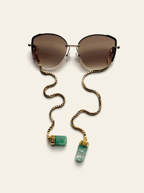 The Cannes - top view of gold semi-rimless butterfly sunglasses with brown gradient lenses and 18K gold-plated box chain