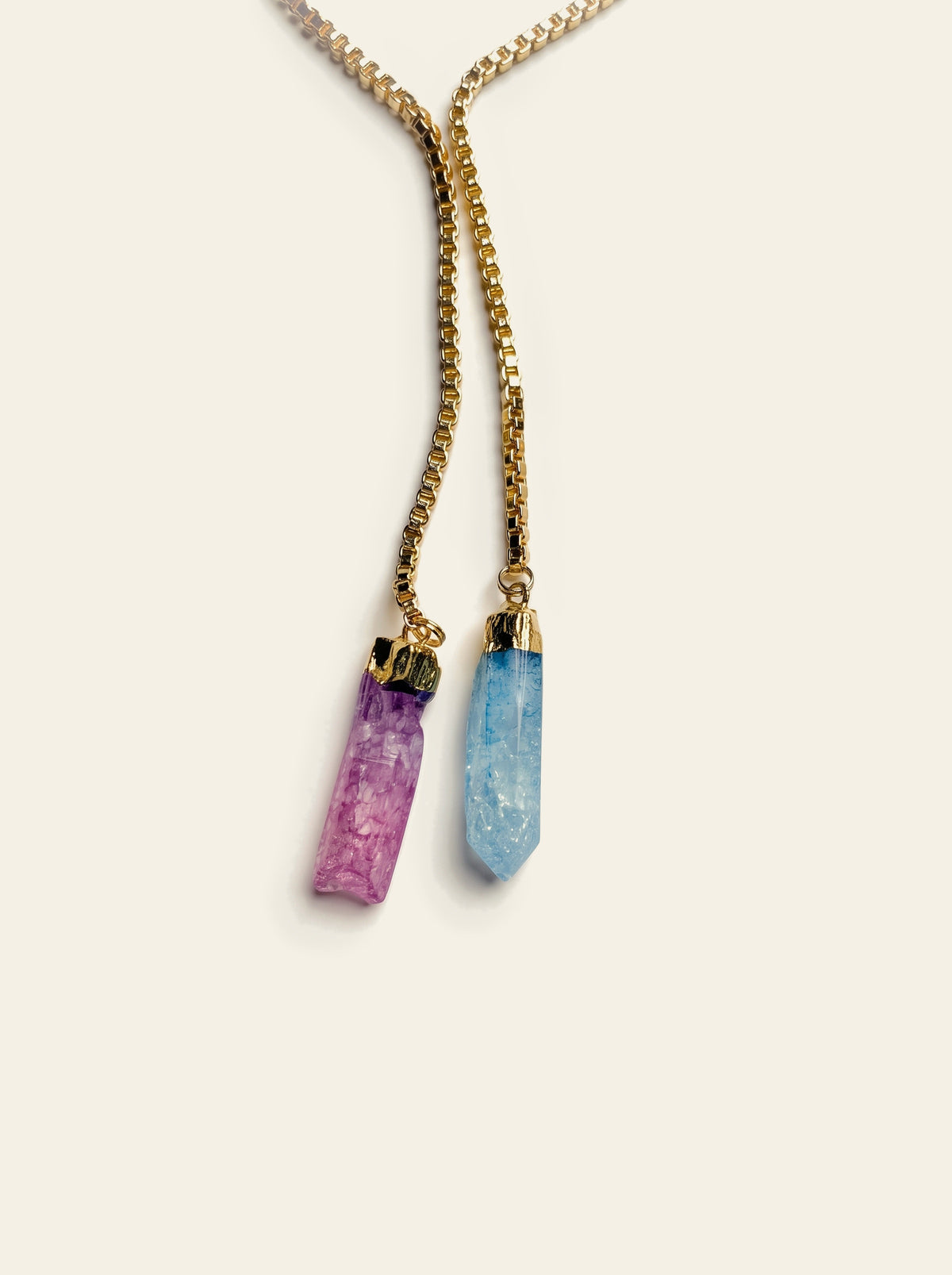 The Mykonos - close-up of the raw pink and blue quartz stones hand-set in gold-dipped caps on the gold box chain